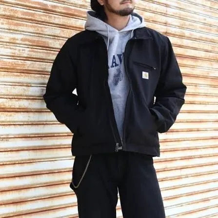 Black vintage Carhartt jacket layered look